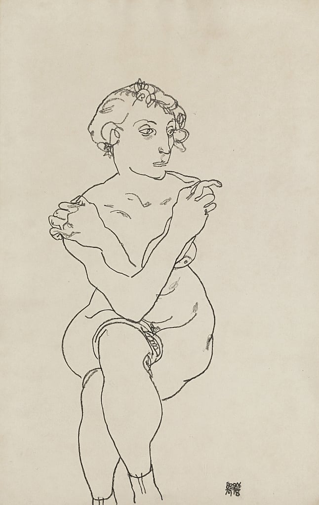 Seated Female Nude Arms And Legs Crossed