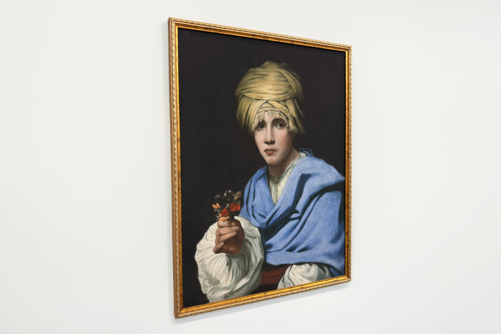 Boy in a Turban Holding a Nosegay - Michiel Sweerts