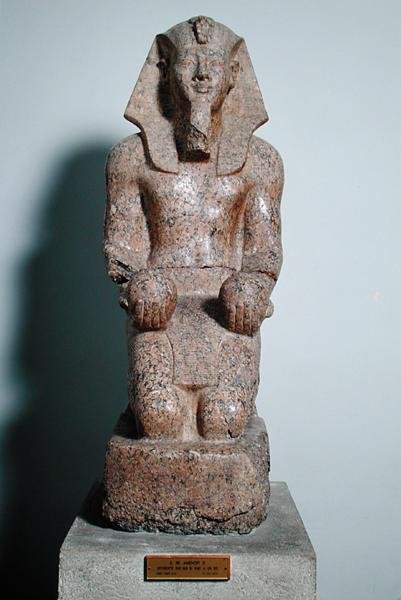 Kneeling statue of Amenhotep II (1427-1392 BC) holding offerings of wine, from Thebes, New Kingdom, c.1450-1425 BC (granite) by Egyptian 18th Dynasty