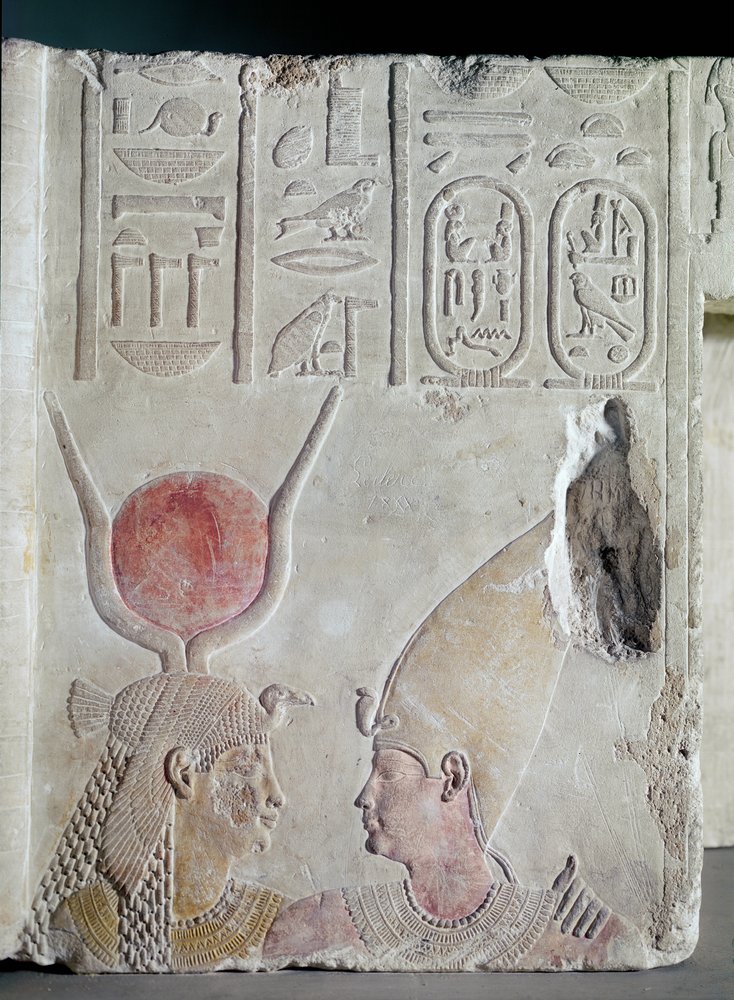 Nectanebo II (360-343 BC) being embraced by the goddess Isis, fragment from a door, Late Period, c.358-341 BC by Egyptian 30th Dynasty
