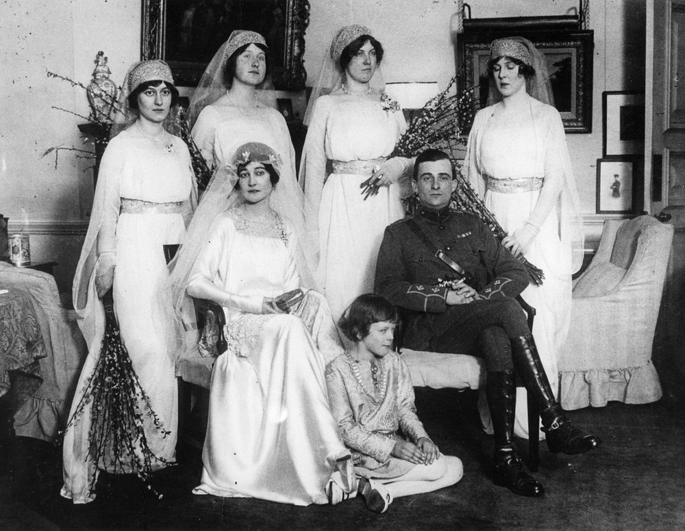 Bride and Bridegroom with Bridesmaids and Train Bearers