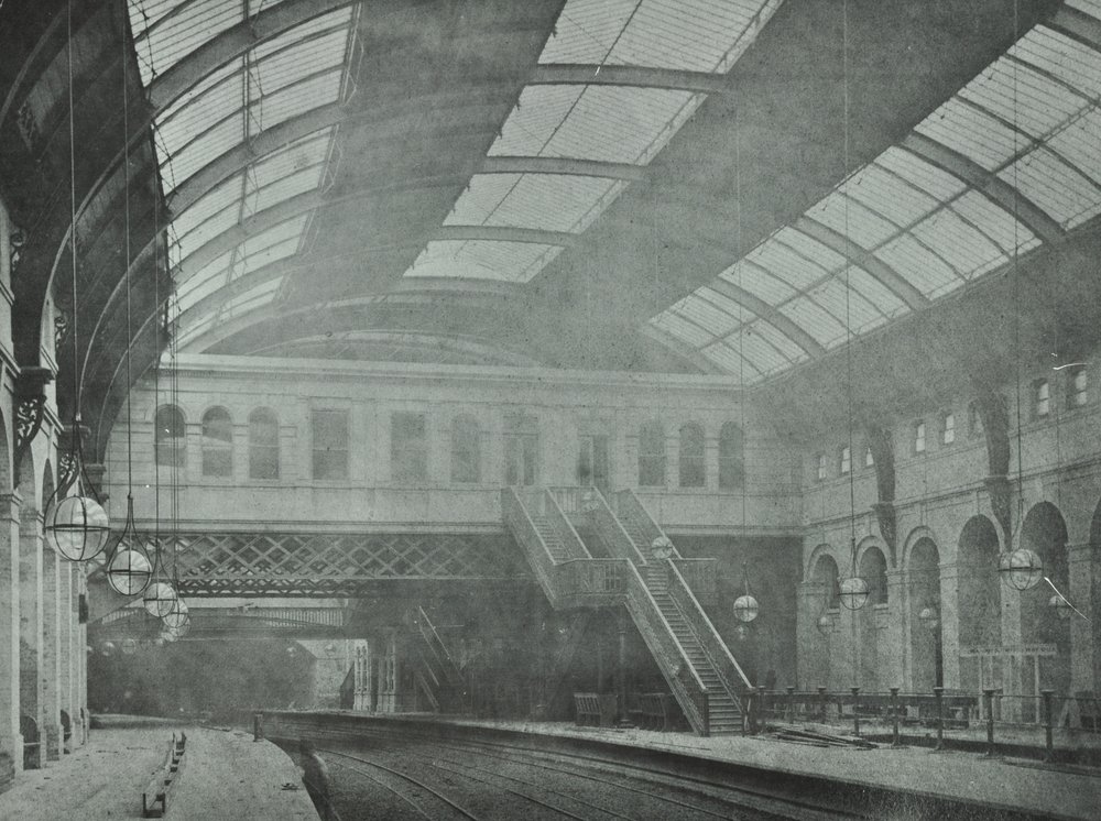 Kings Cross Station: view of the platforms by English Photographer