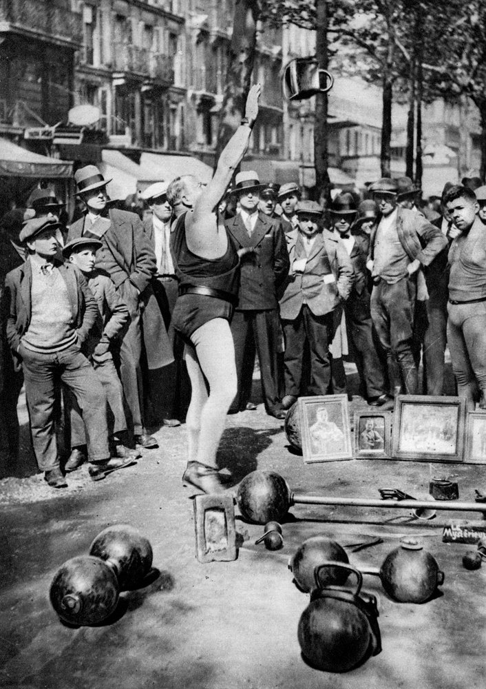 Strongman Juggling with Weights, Paris by Ernest Flammarion