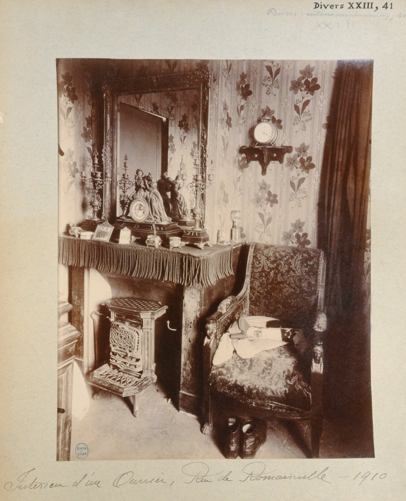 Interior of a working class home in the rue de Romainville, Paris, 1910 by Eugène Atget