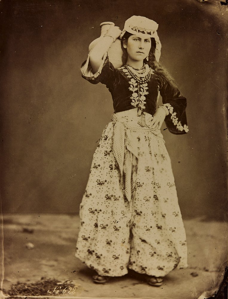 Album Damascus and Baalbek: Young Syrian woman in traditional clothes by Félix Bonfils