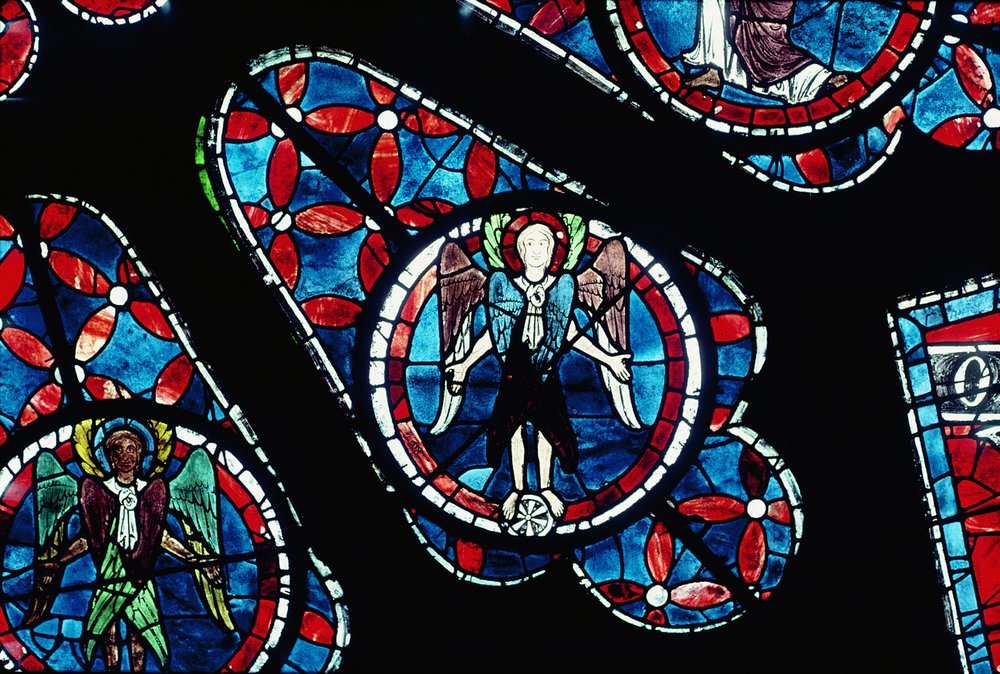 Cherubim on wheel, detail (north rose window) by French School