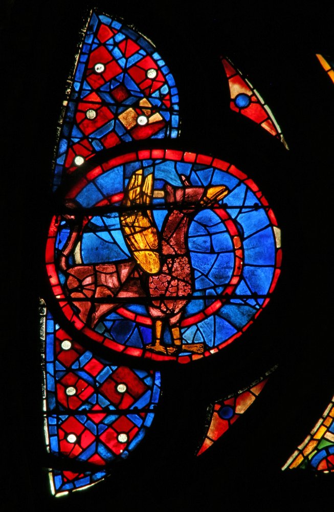 Window w115 depicting a winged beast by French School