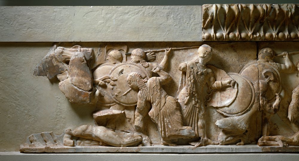 Greek Ionic art: northern frieze of the Treasury of Siphnos: scene of gigantomachy, Apollo and Artemis fighting against a giant. 525 BC. Delphi, archaeological museum by Greek