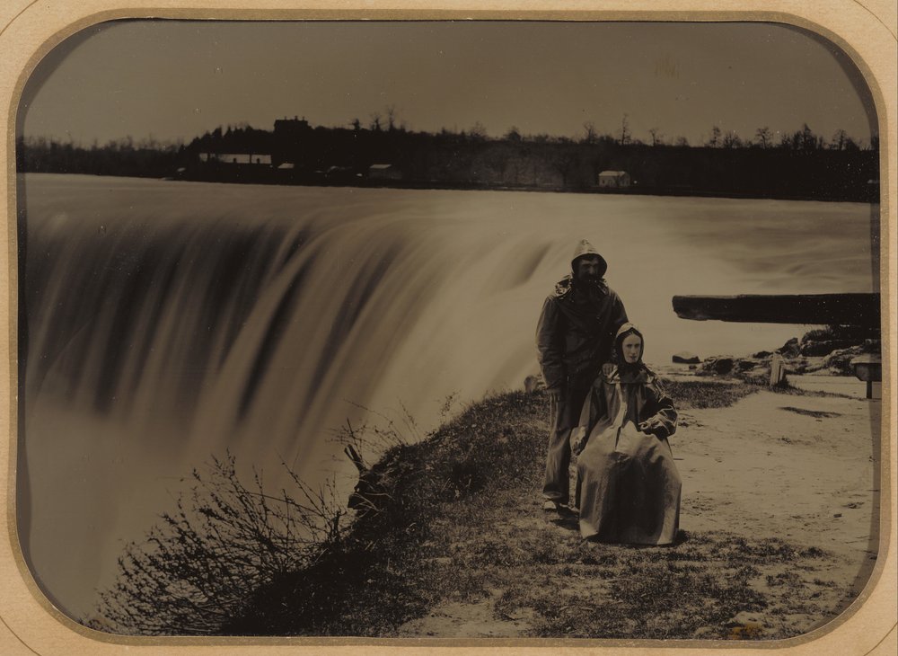 Couple at Niagara Falls in Waterproofs by Henry Hollister
