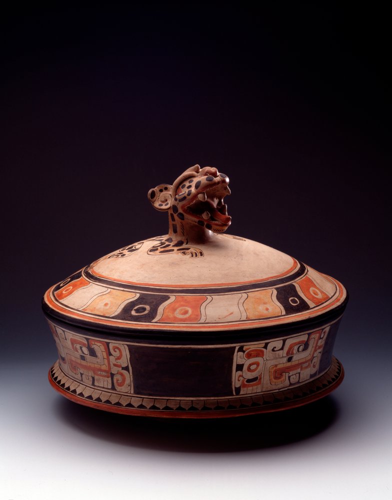 Pre-Columbian art, Maya civilization, Early Classic period: clay vase with a lid decorated with a jaguar head. From Tikal, Guatemala. Dimensions: height 26.5 x width 31 cm. Guatemala, Museo Nacional de Arqueología y Etnología by Mayan Mayan
