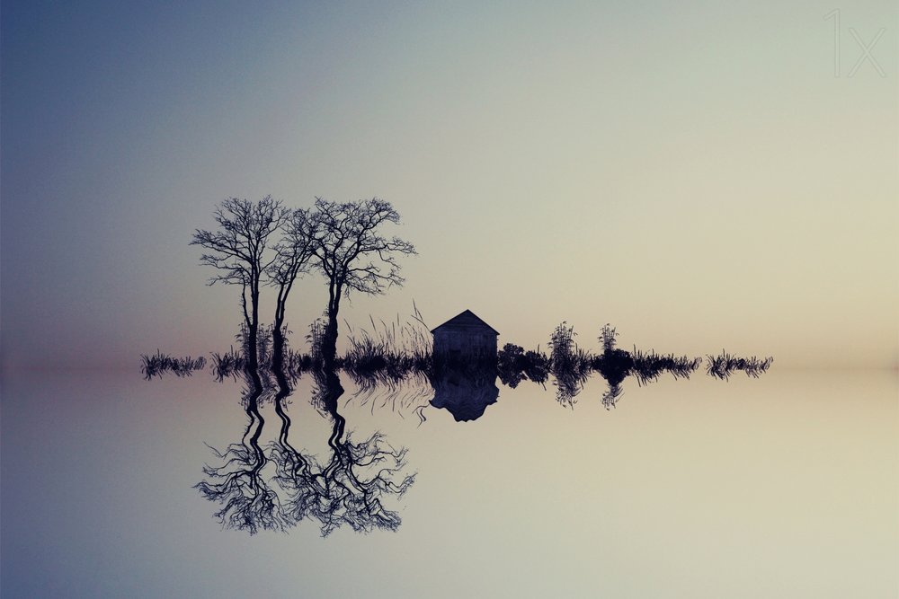Serene Water Reflection by Asef Azimaie