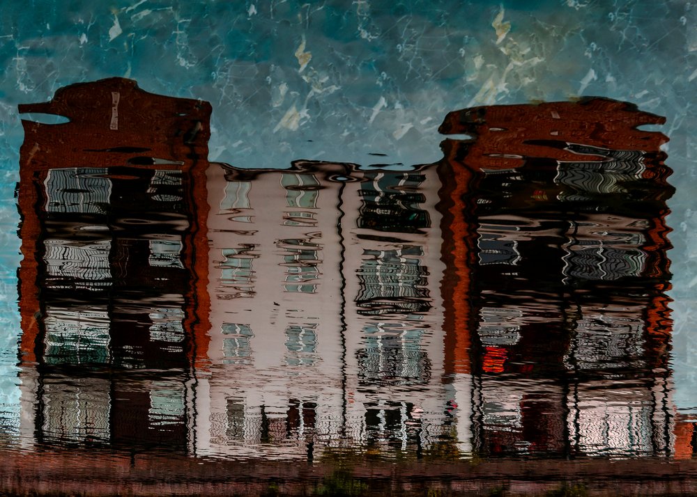 Rippled Building Reflection by Chris Hamilton