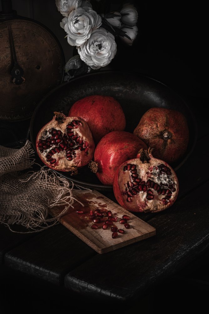 Elegant Pomegranate Still Life by Enrico Sottocorna