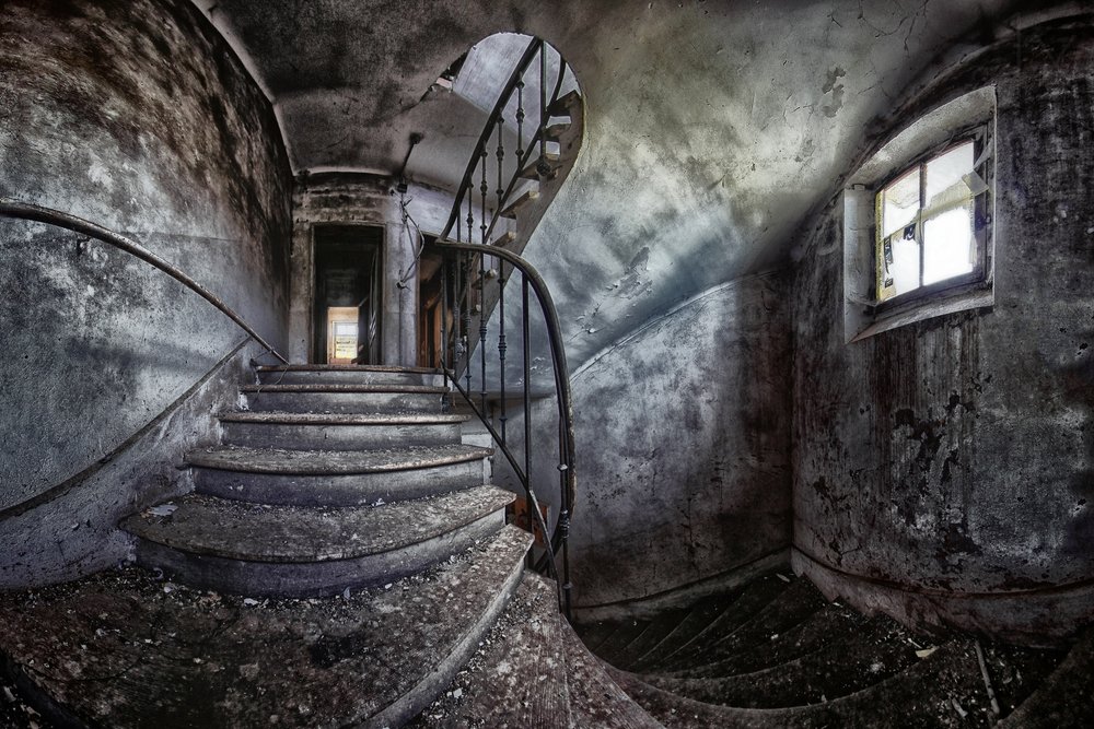 Abandoned Spiral Staircase by Francois Casanova