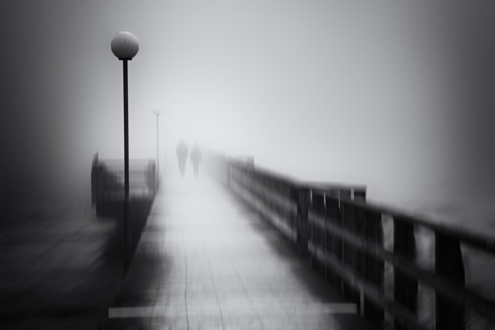 Mysterious Foggy Pier Walk by Gustav Davidsson