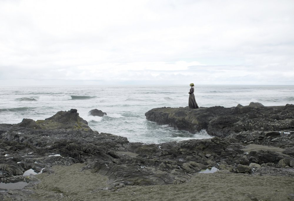 Solitary Woman Coastal View by Jeffrey Hummel