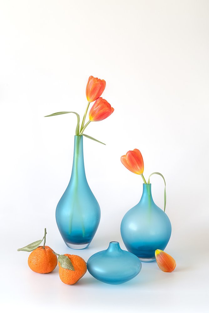 Orange Tulips Blue Vases by Lydia Jacobs