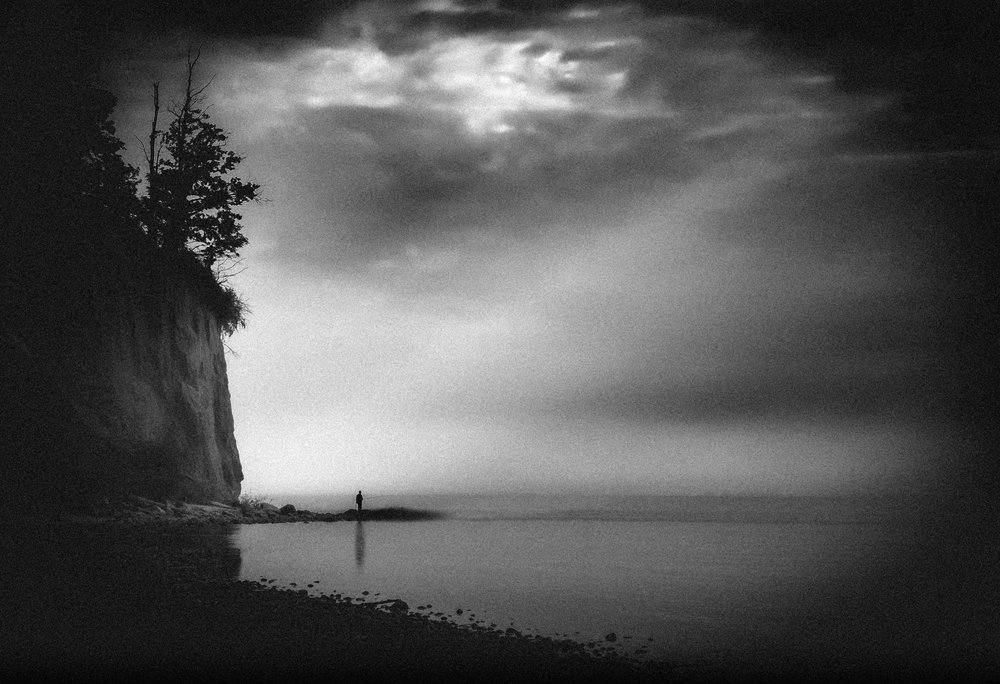 Lone Figure Misty Shore by Monika Zemojtel