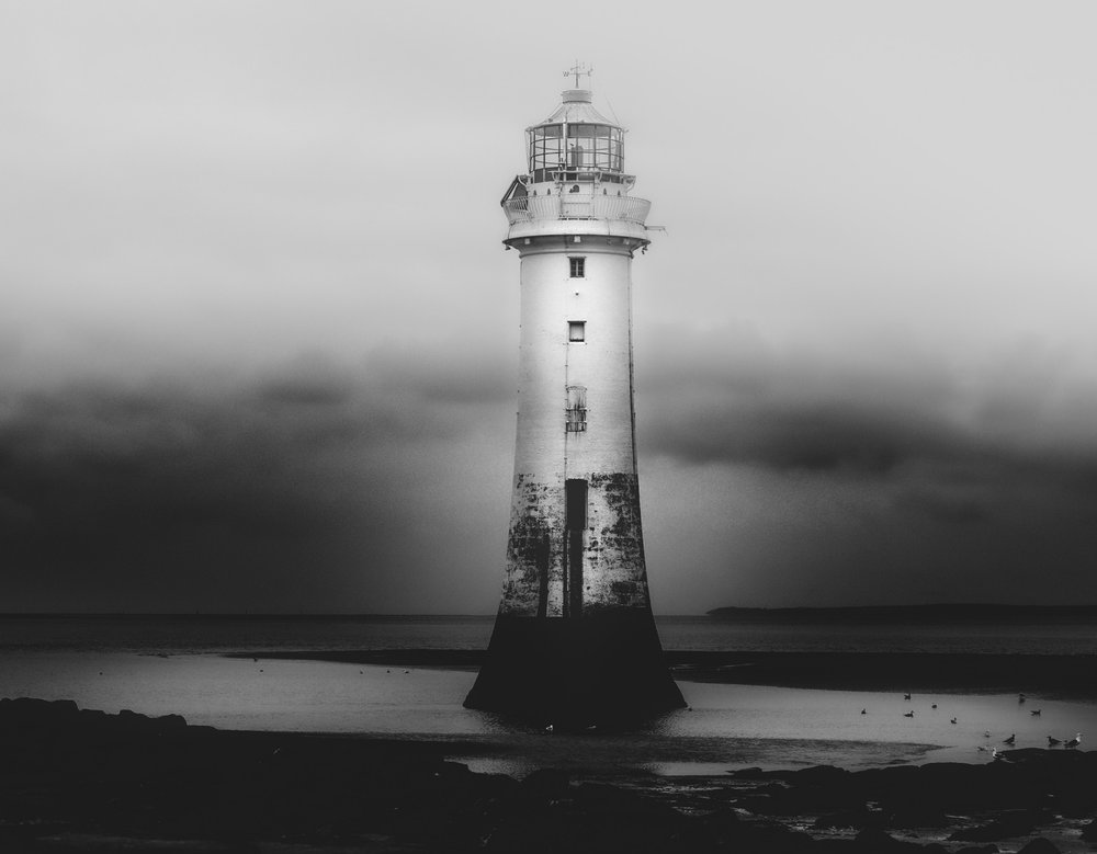Solitary Coastal Lighthouse by Monika Zemojtel
