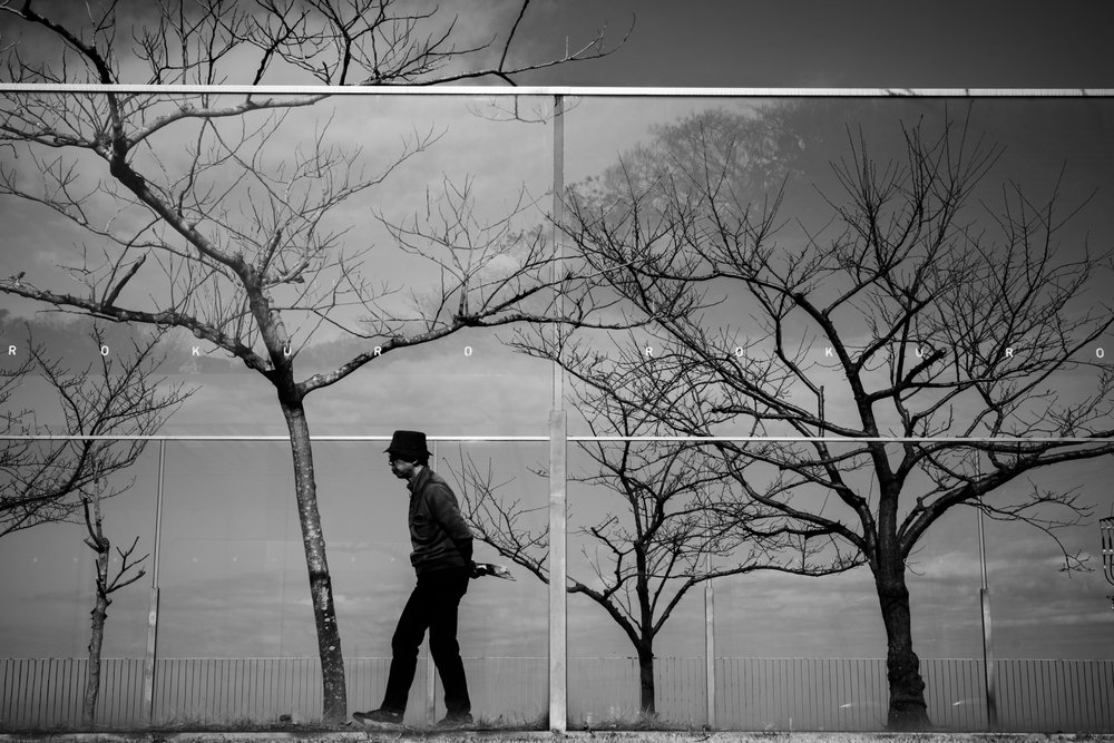 Solitary Urban Reflection by Satoshi Hata