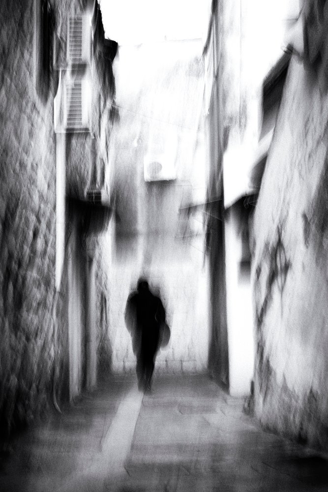 Blurred Figure In Alley by Tito Mindoljevic