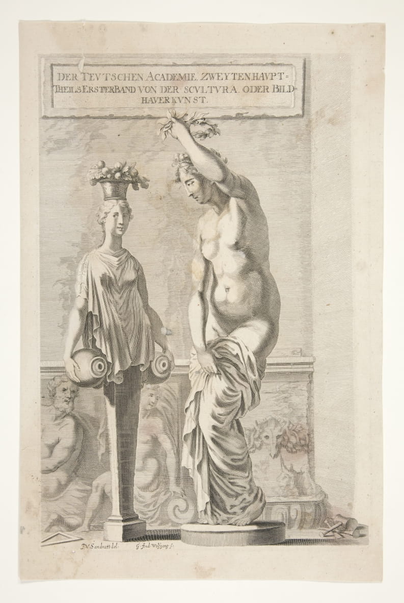 A Statue and Female Herm Carrying Vases and Fruit
