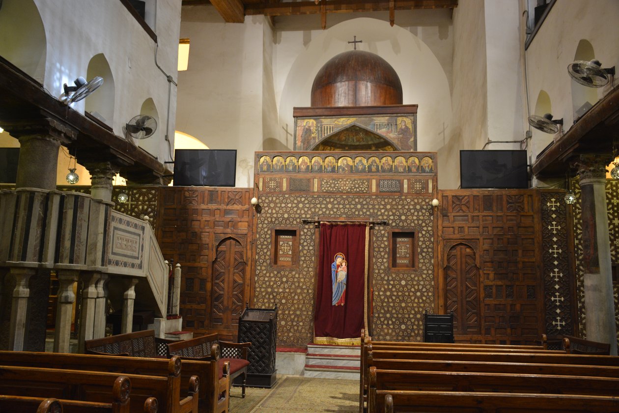 Interior of Abo Serga Church in Old Cairo, historic Coptic Orthodox church with icons and wooden iconostasis by Albert Mansour