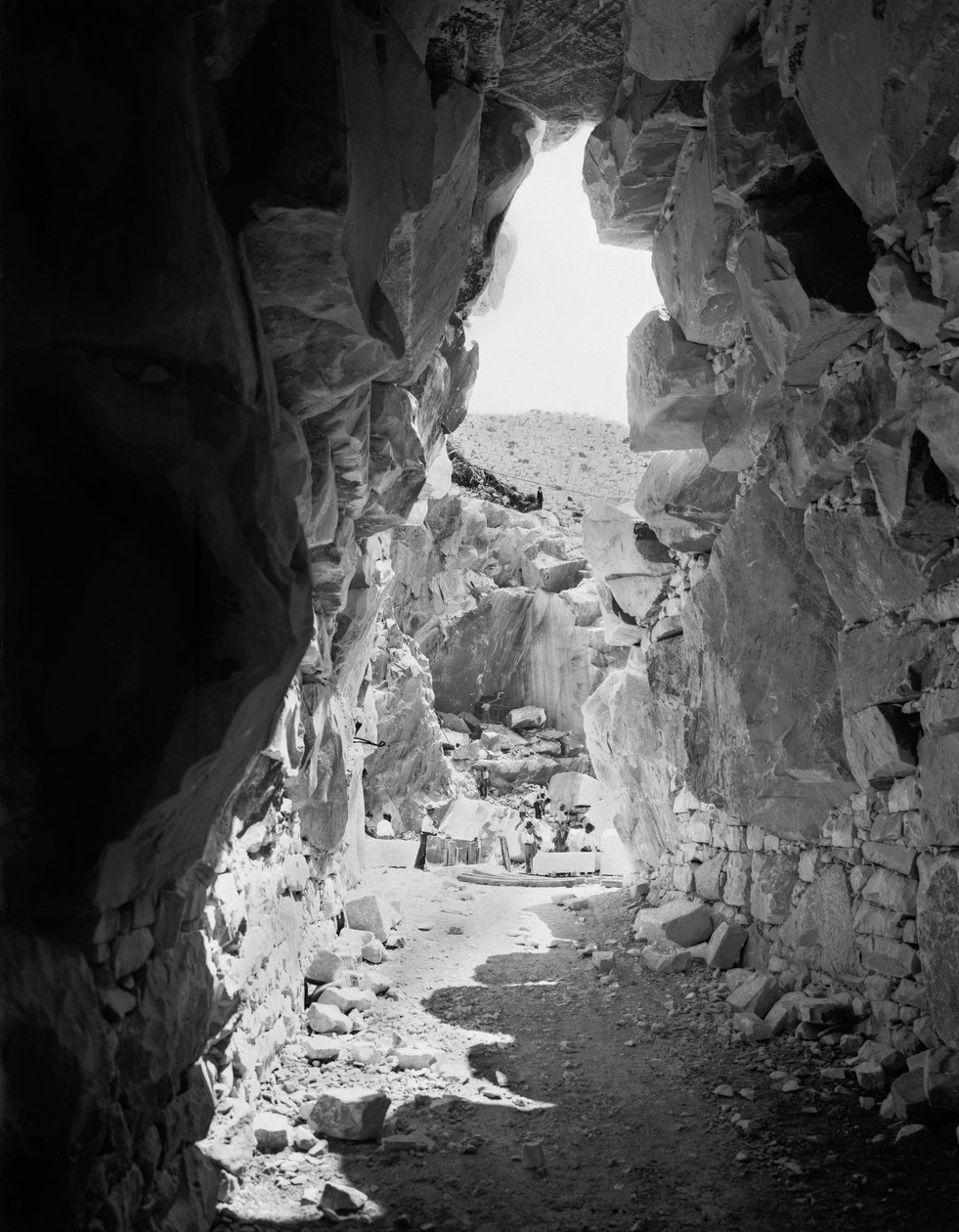 Excavators at work at a marble quarry in the Apuan Alps, Tuscany by A. Corsini