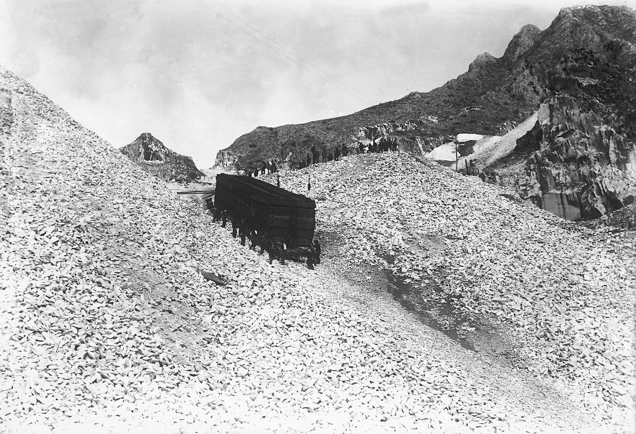 Transport of an enormous convoy containing marble, along a road near a quarry in the Apuan Alps, Tuscany by A. Corsini