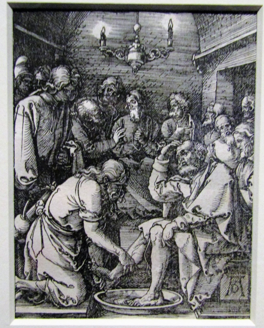 Christ Washing the Feet of the Disciples from the Small Passion by Albrecht Dürer
