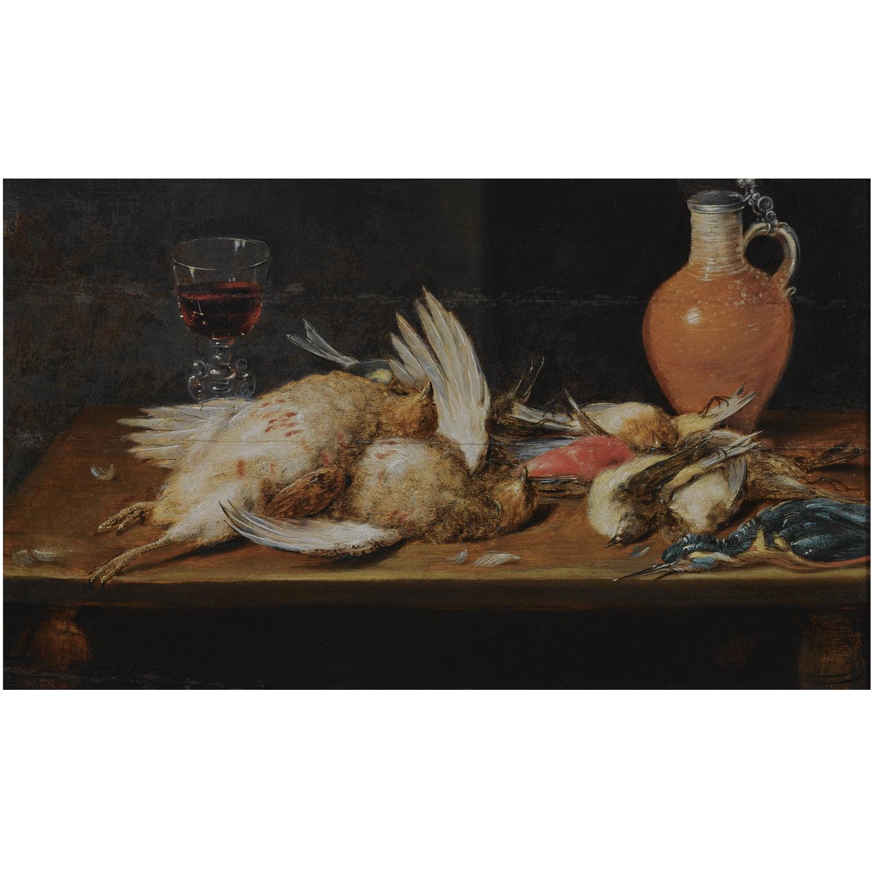 A still life with a robin, a kingfisher, partridges and songbirds, all on a wooden table, together with a glass and an earthenware jug by Alexander Adriaenssen