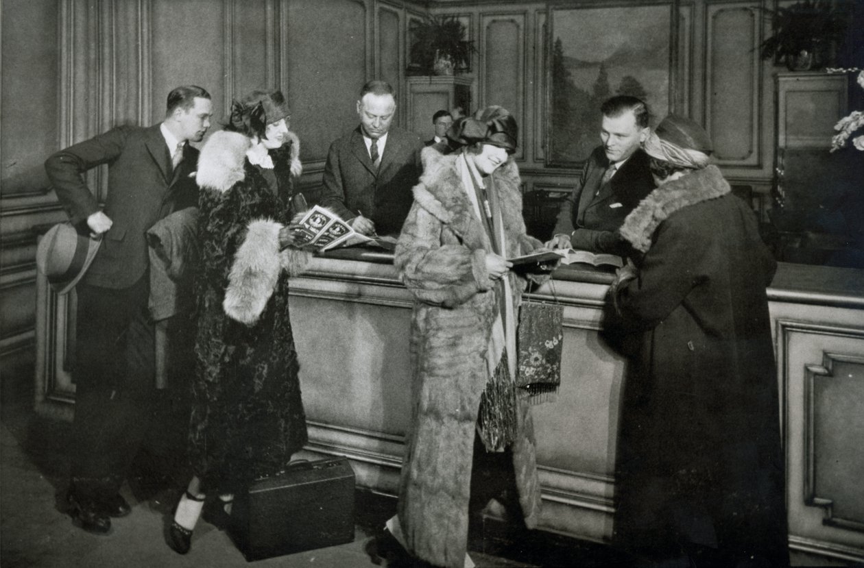 Passengers purchasing tickets at the ticket office of the Great Northern Railway, Chicago by American Photographer