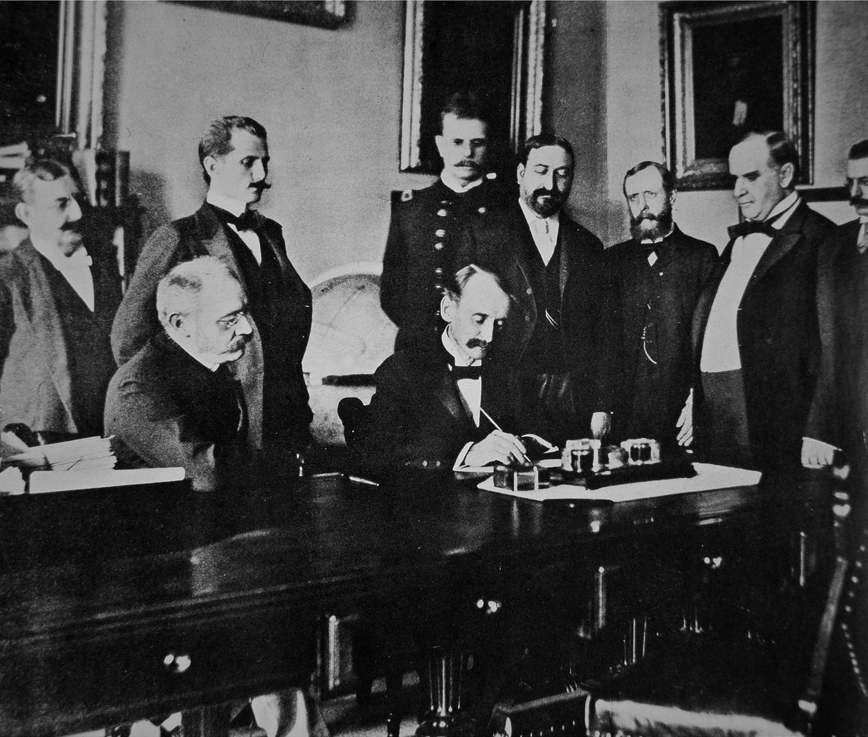 President William McKinley witnesses the signing of the Peace protocol that ended the war with Spain by American Photographer