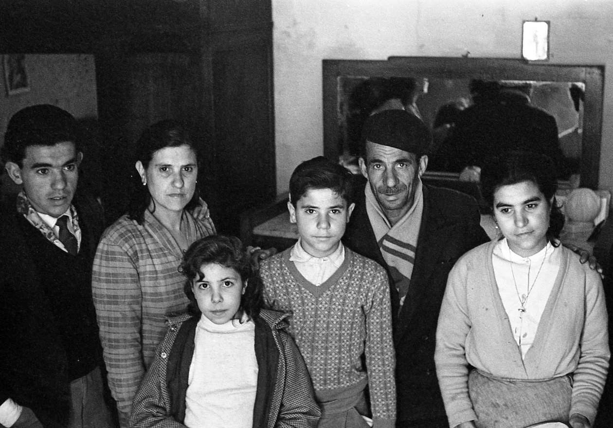 Family Group in a Basement by Ando Gilardi