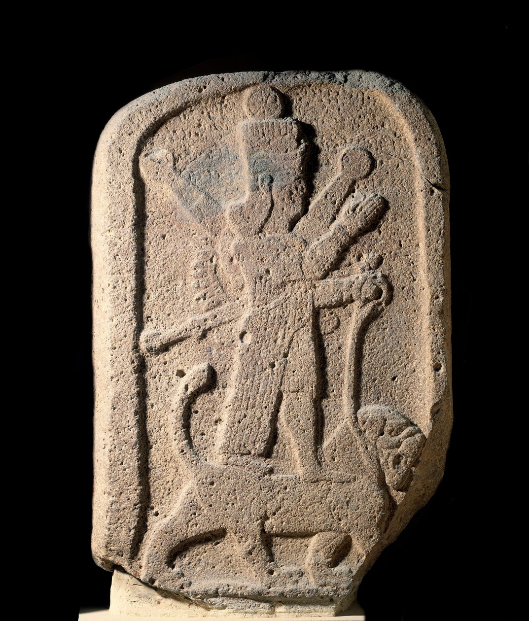 Stele representing the goddess Ishtar of Arbeles holding a lion by Assyrian