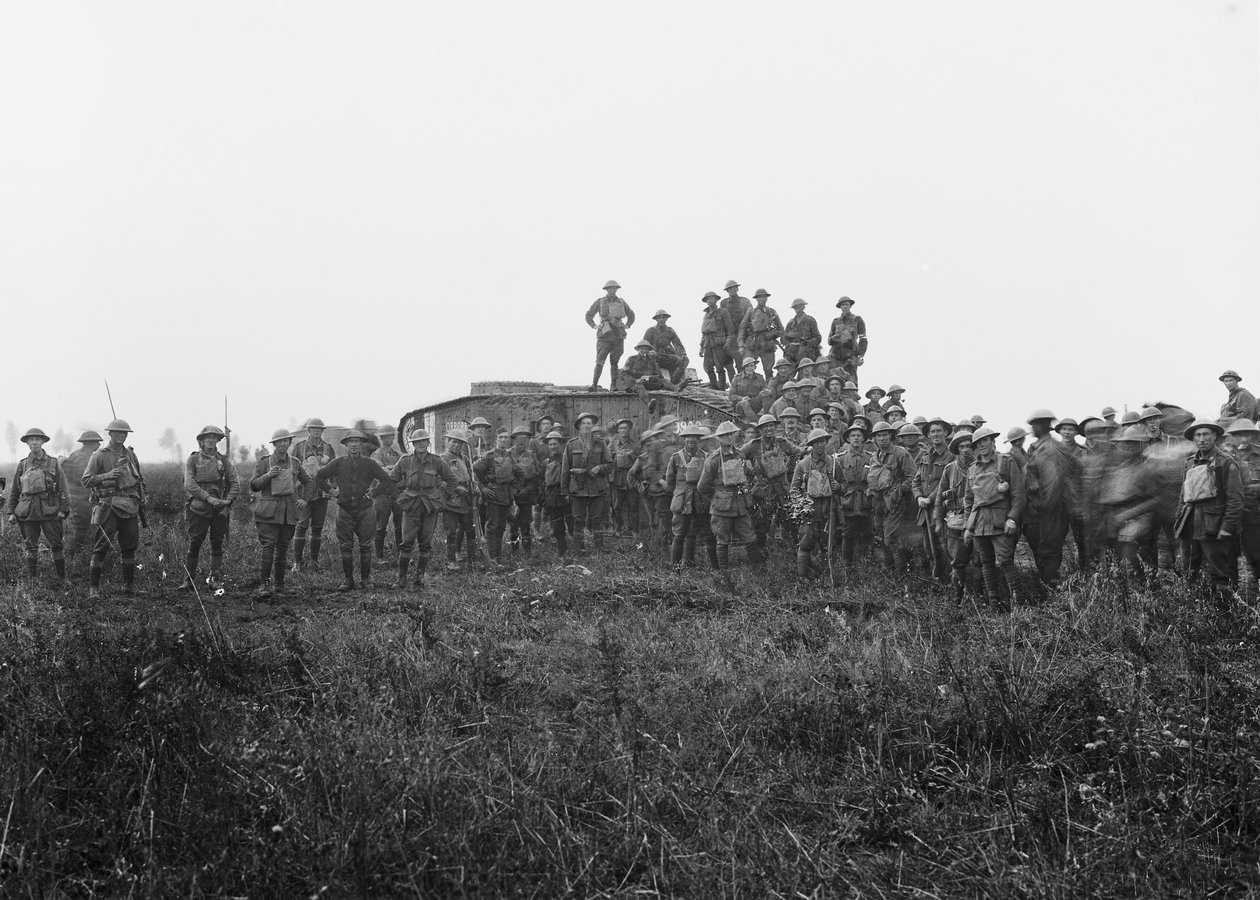Outdoor group portrait of a tank crew and some members of the 5th Australian Infantry Brigade, 8 August 1918 by Australian Photographer