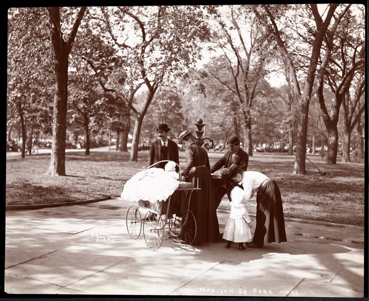 Men and Women with Children at a Drinking Fountain in Madison Square Park, New York by Byron Company