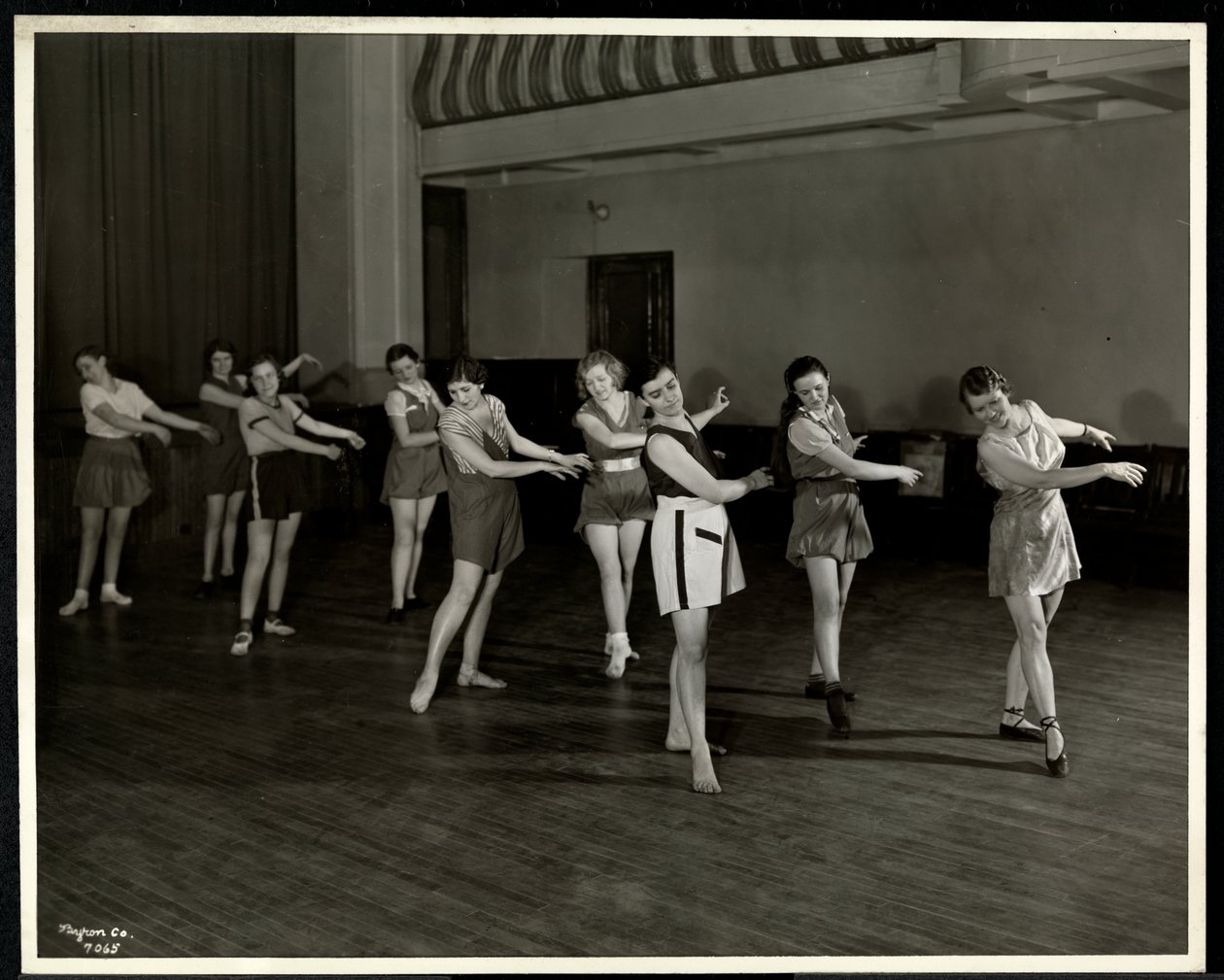 Mrs. Dean and eight dancing girls in the gymnasium of the New York Association for the Blind, 111 East 59th Street, New York, 1935 by Byron Company