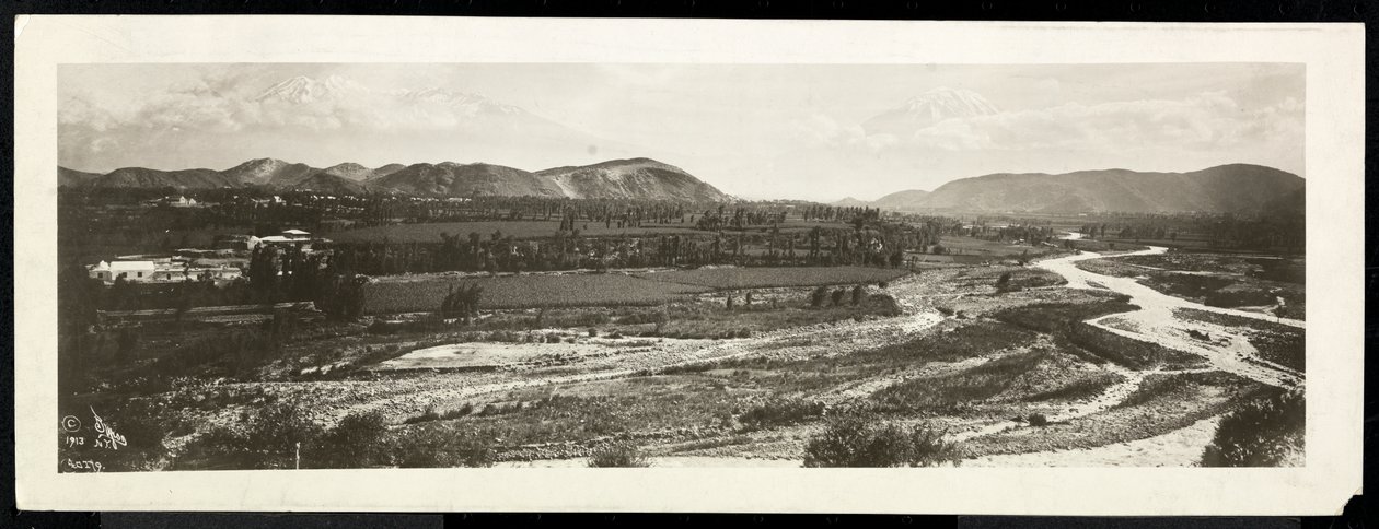 Panoramic view of a rural scene, presumably on or near the Panama Canal with snowcapped mountains beyond by Byron Company