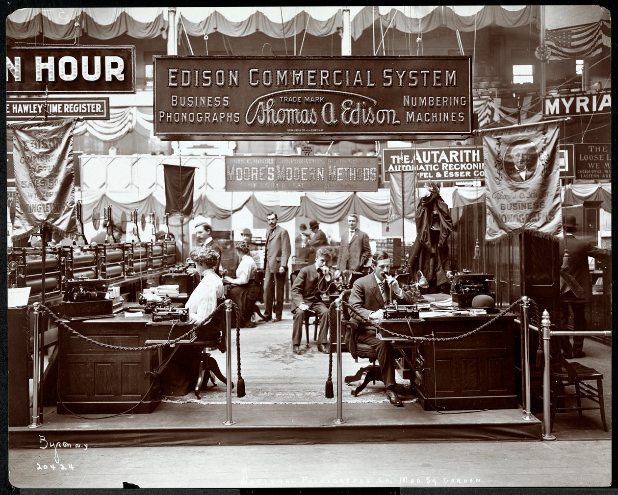 View of the Edison Co. Booth of Office Equipment at a Trade Show at Madison Square Garden, New York, 1905 by Byron Company