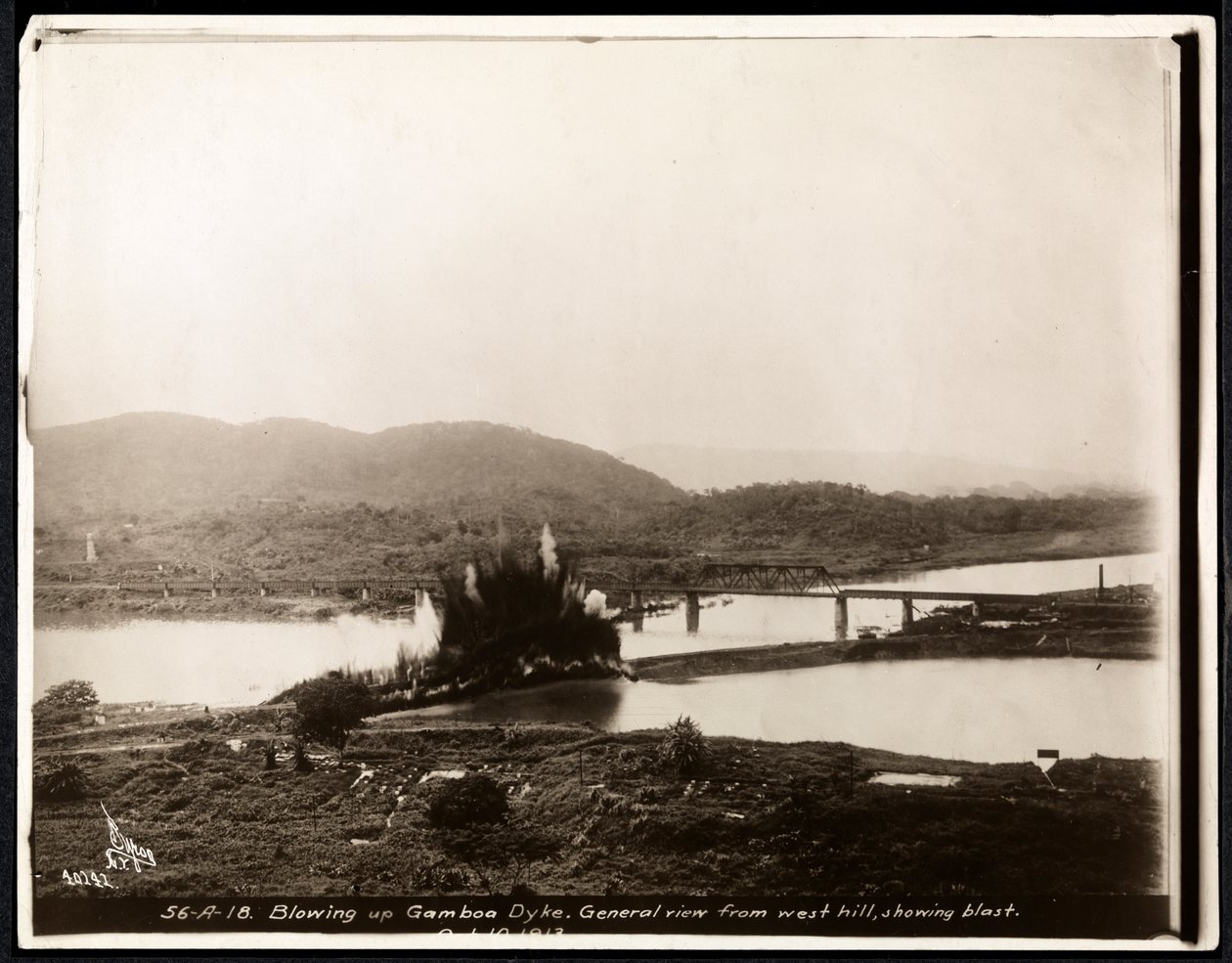 View of the explosion from blowing up the Gamboa Dike during the construction of the Panama Canal, 1913 by Byron Company