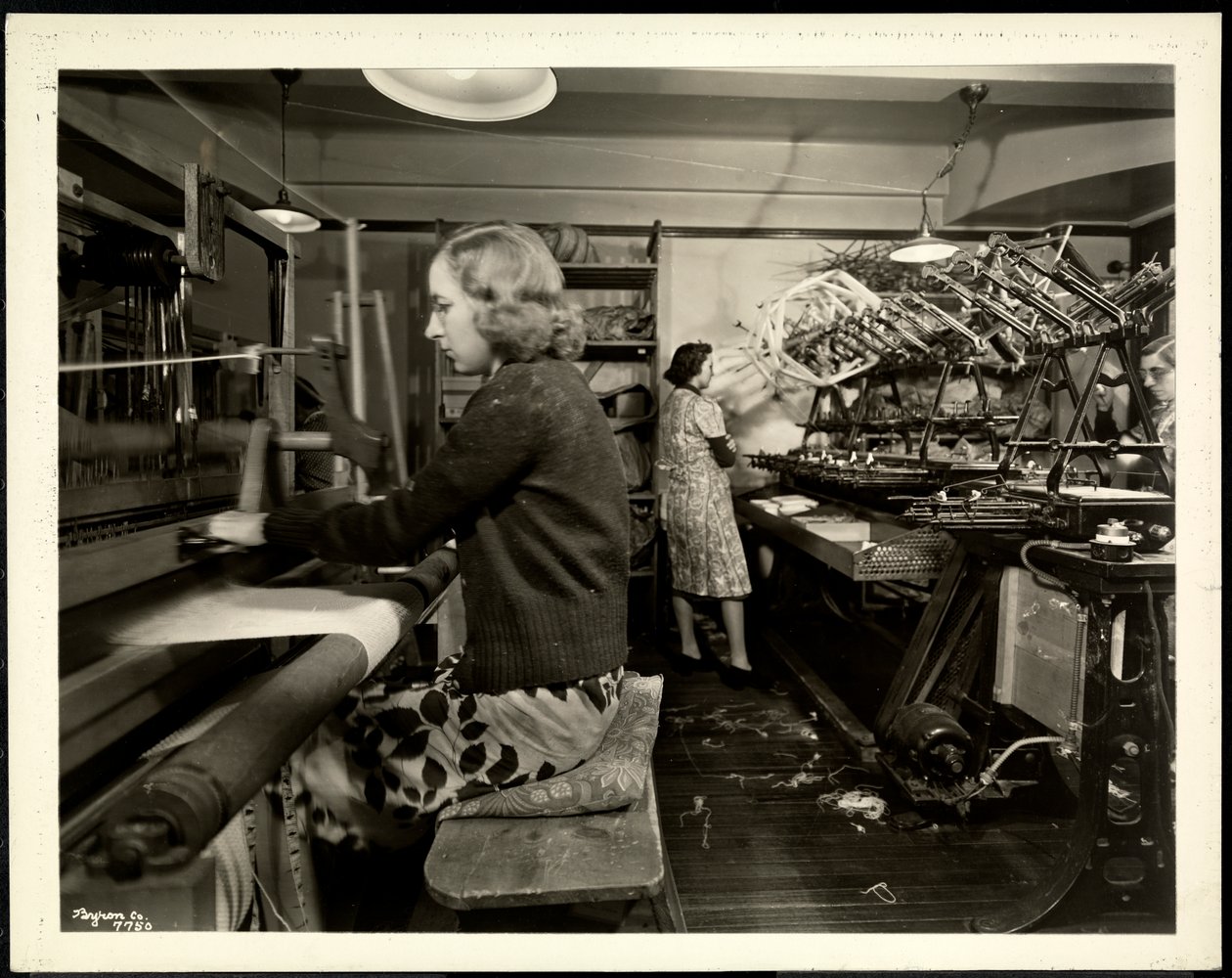 Women on the Loom Floor at the New York Association for the Blind, 111 East 59th Street, New York by Byron Company