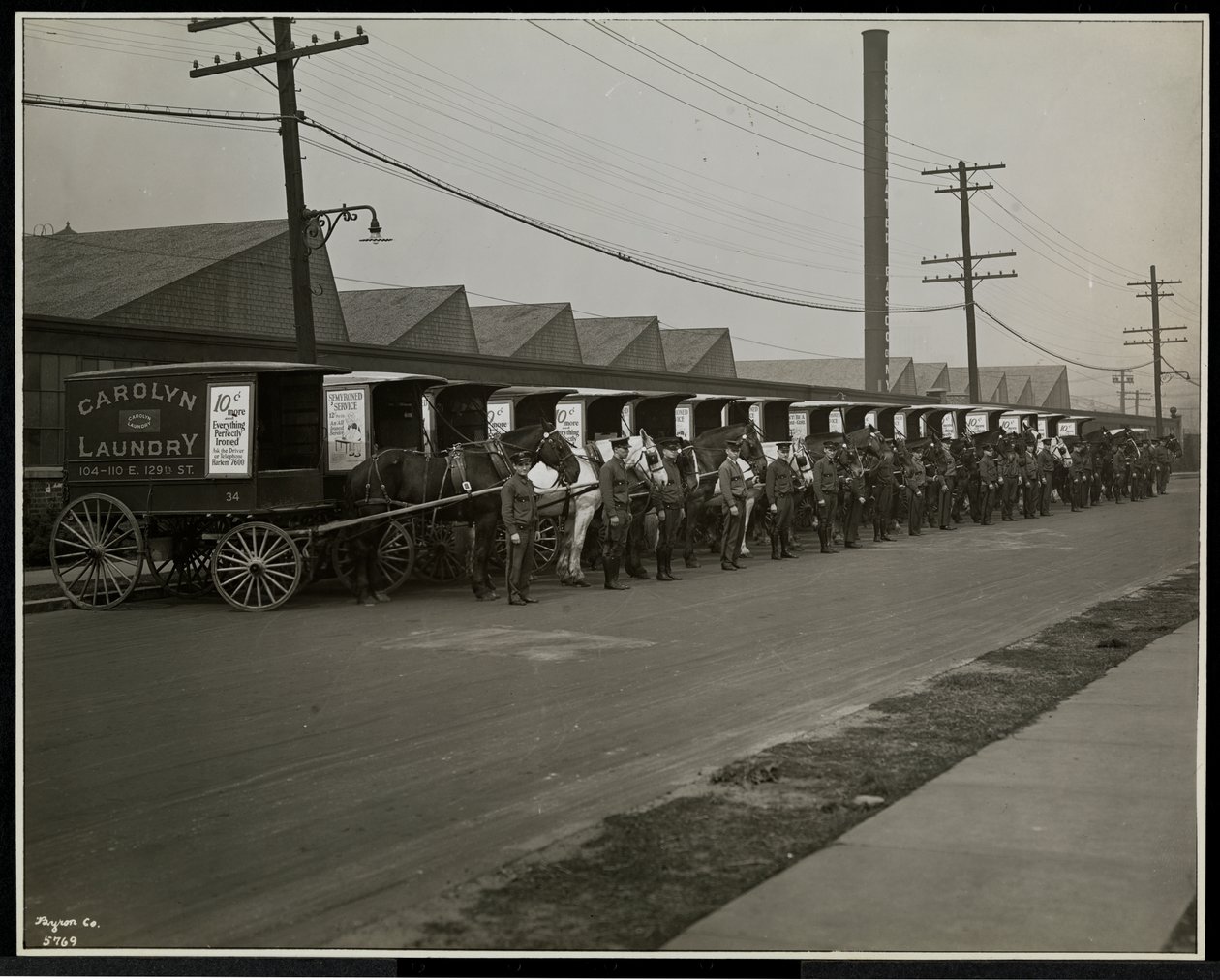 Horsedrawn Delivery Wagons Parked Outside the Carolyn Laundry at 111 East 128th Street, East Harlem, New York, 1929 by Byron Company