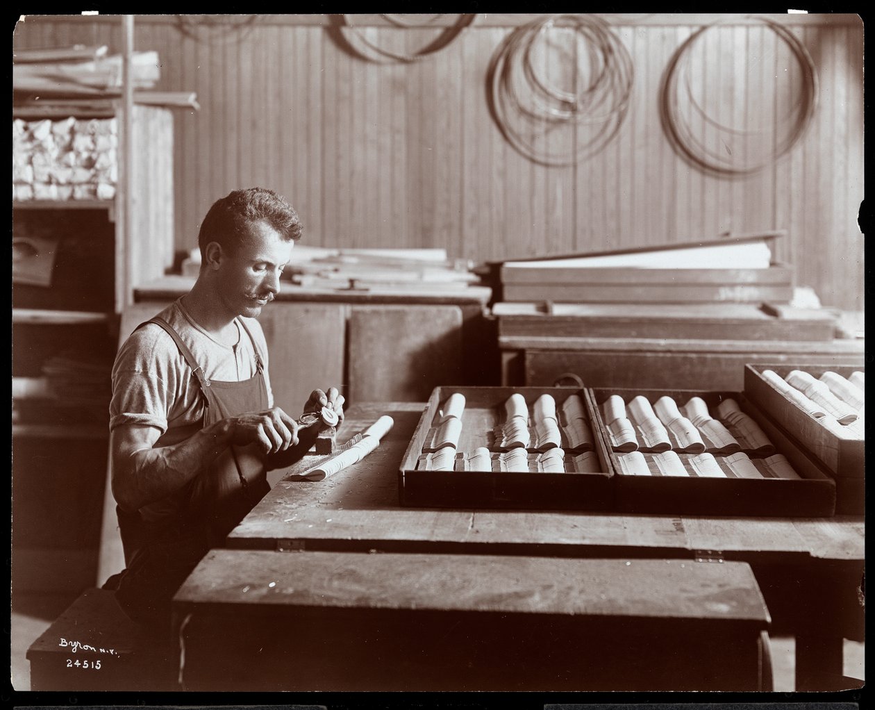 Man Working in the Hardman, Peck and Co. Piano Factory, New York, 1907 by Byron Company