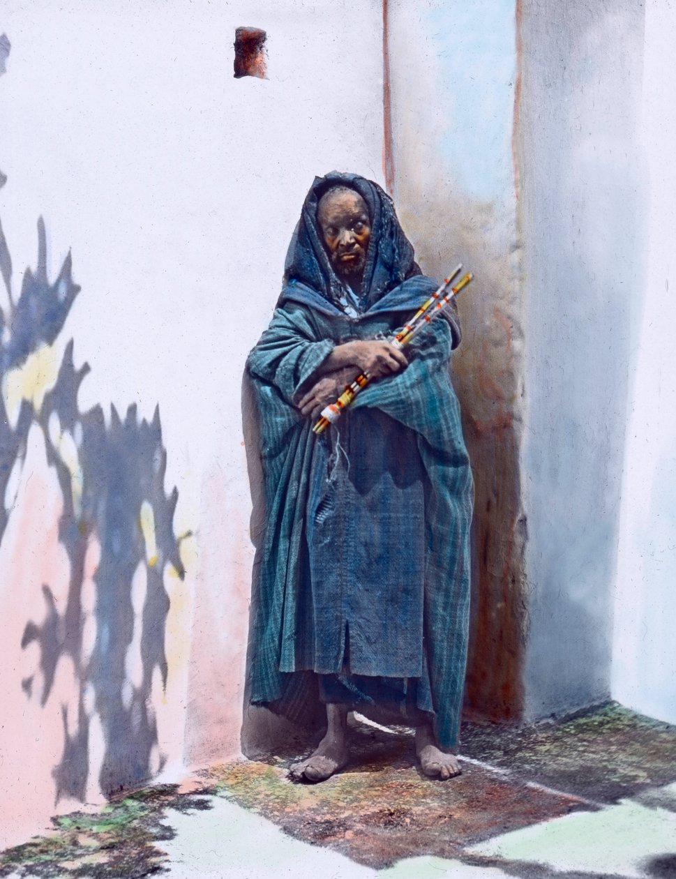 Portrait of a Beggar, Morocco, circa 1910. Carl Simon Archive by Carl Simon
