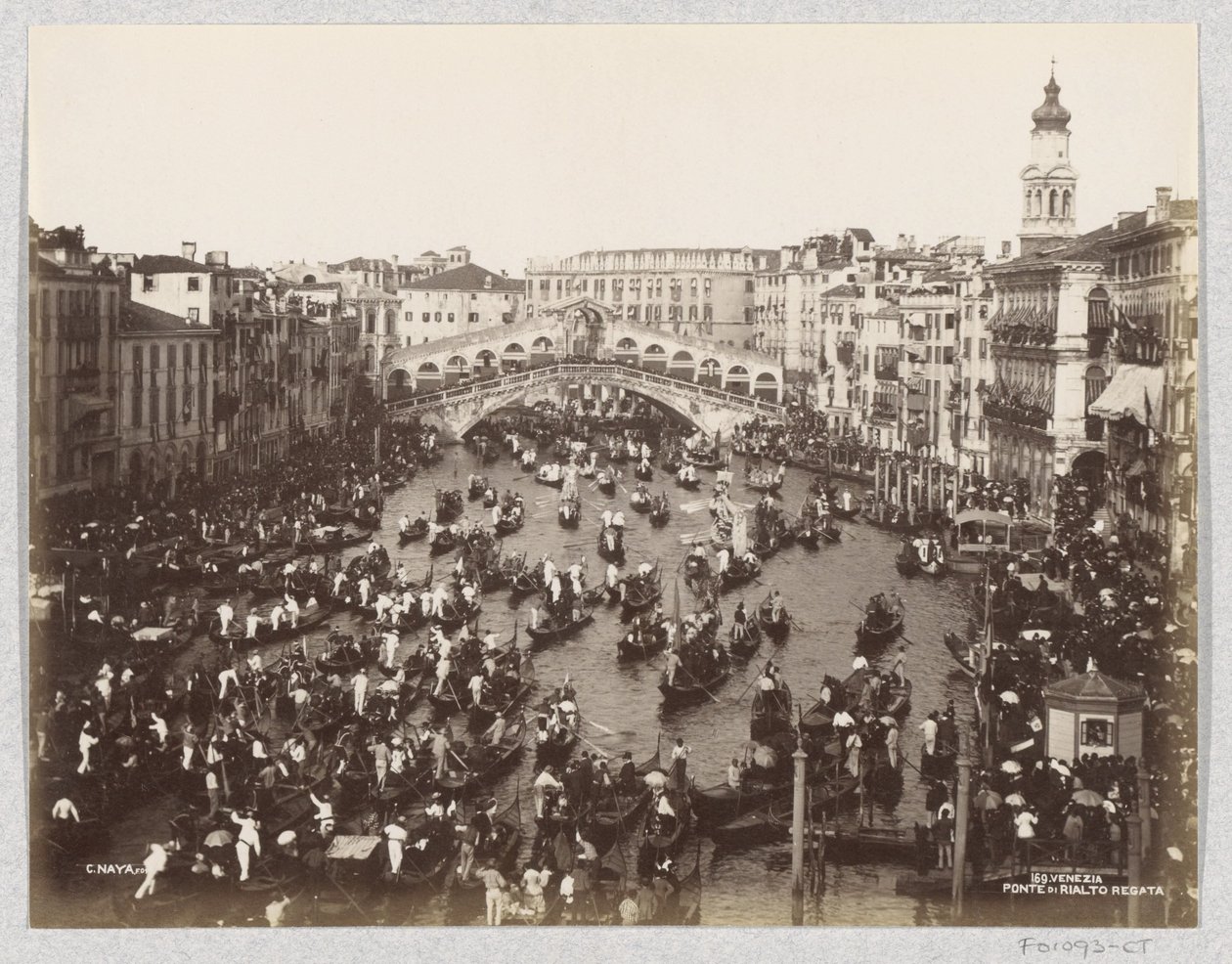 Regatta of Gondolas on the Grand Canal in Venice near the Rialto Bridge by Carlo Naya