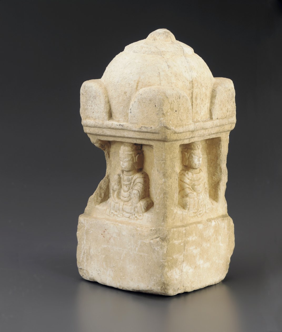 Small stupa, domed roof and Buddhist figures occupying recesses on all 4 faces, square pedestal, Period of Division, 557-581 by Chinese School