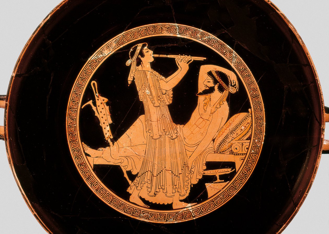 Banquet and double flute player (Detail from kylix or Attic red-figure cup, c.490 BC) by Colmar Painter