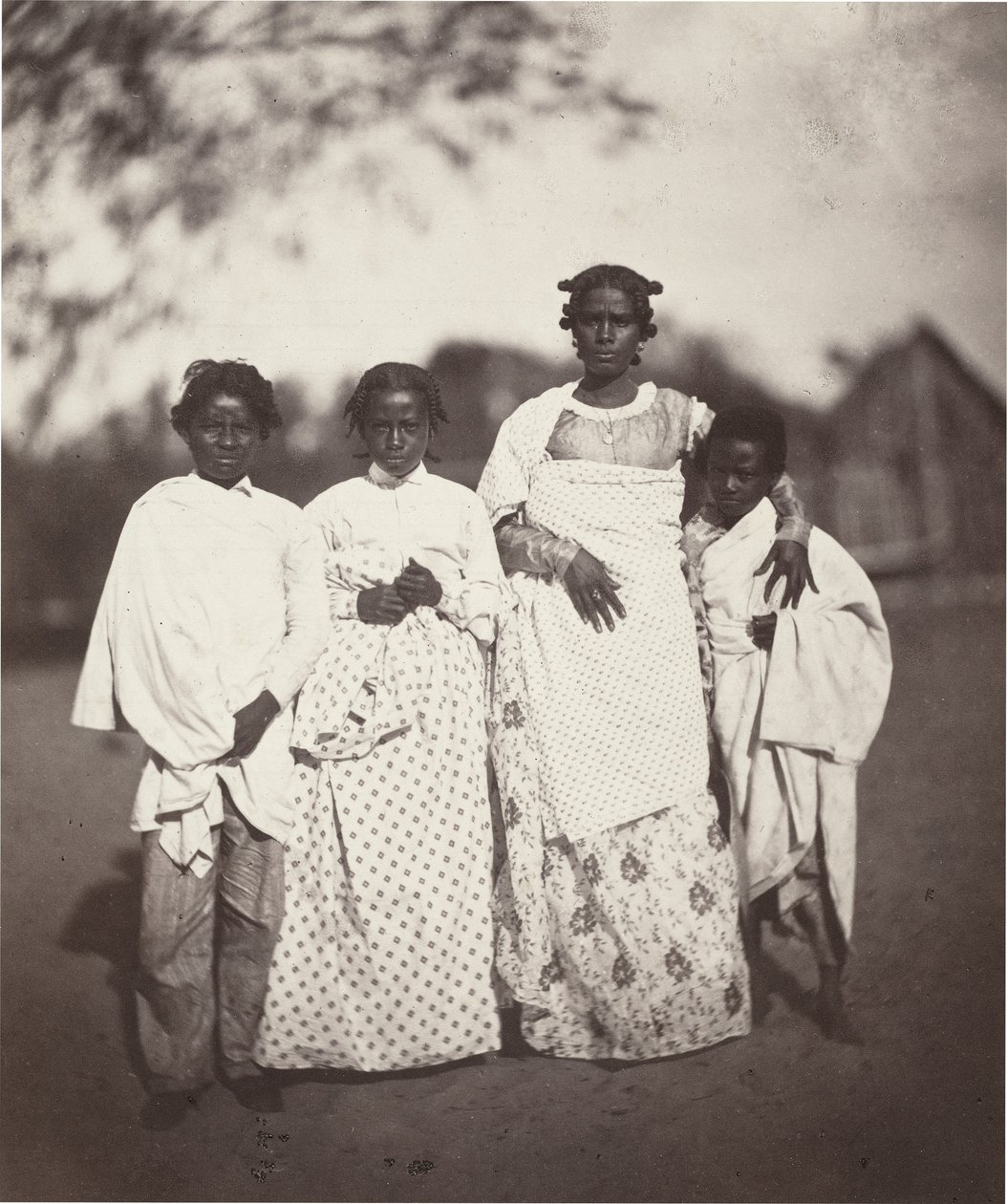Madagascan Woman and Her Children (Plate 3) by Désiré Charnay