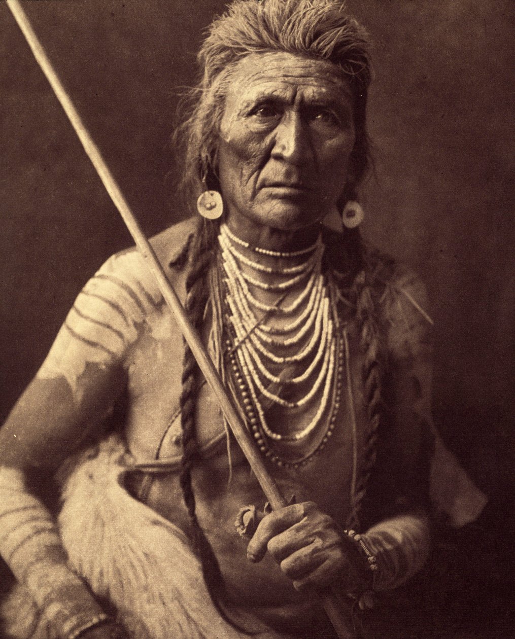 Wolf, Indian Apsaroke. Photo taken from volume 4 of the encyclopedia published by Edward S. Curtis on the Indians of North America, with a foreword by Theodore Roosevelt by Edward Sheriff Curtis